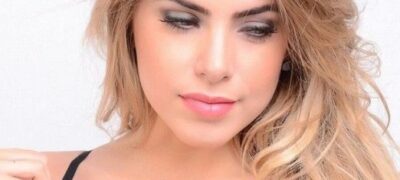 Bailarina do Faustão posa sexy de lingerie em feira de moda
